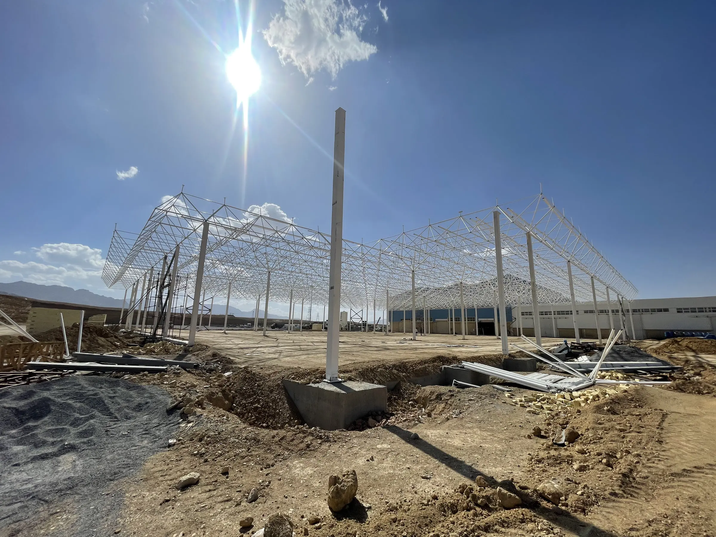 The Arian Motor site with the space-frame roof beyond, erection still in progress