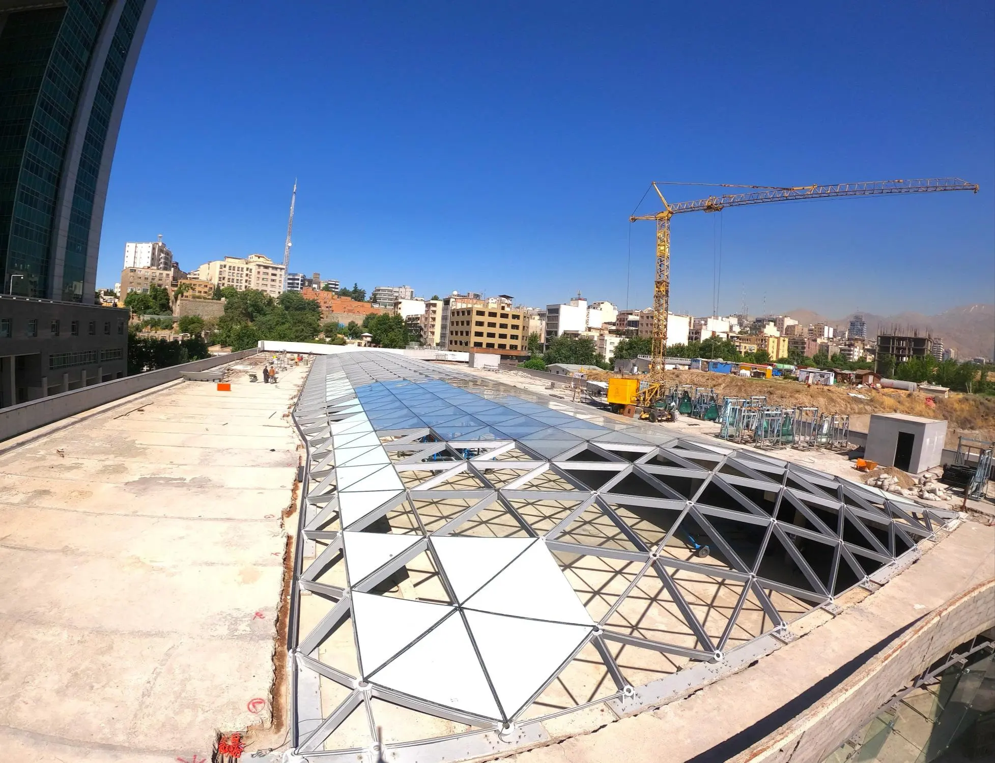 Auto Mall Skylight, Tehran — free-form roof glazing installed above a live city block
