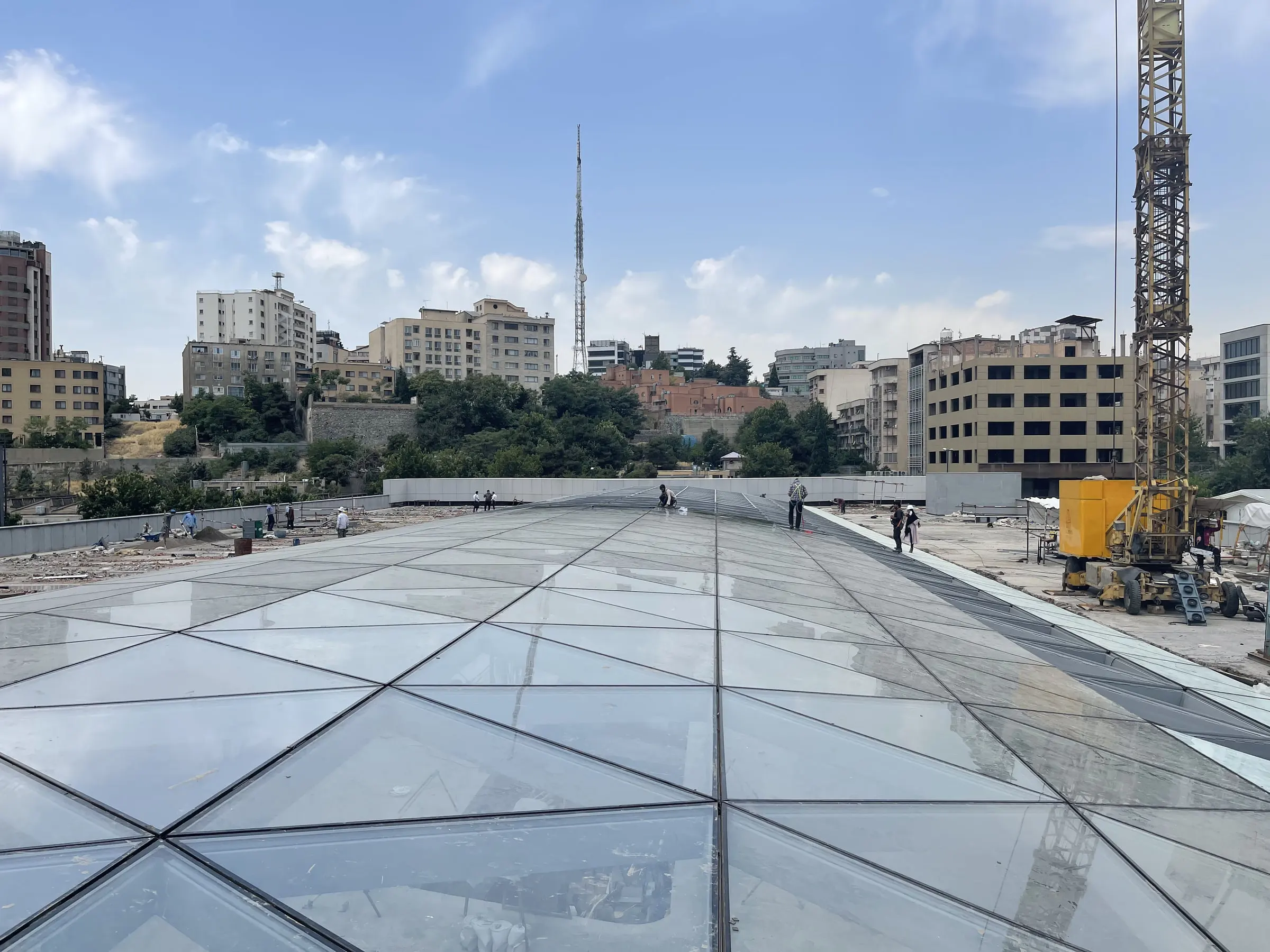 The completed Auto Mall skylight walked from above, Tehran beyond the parapet