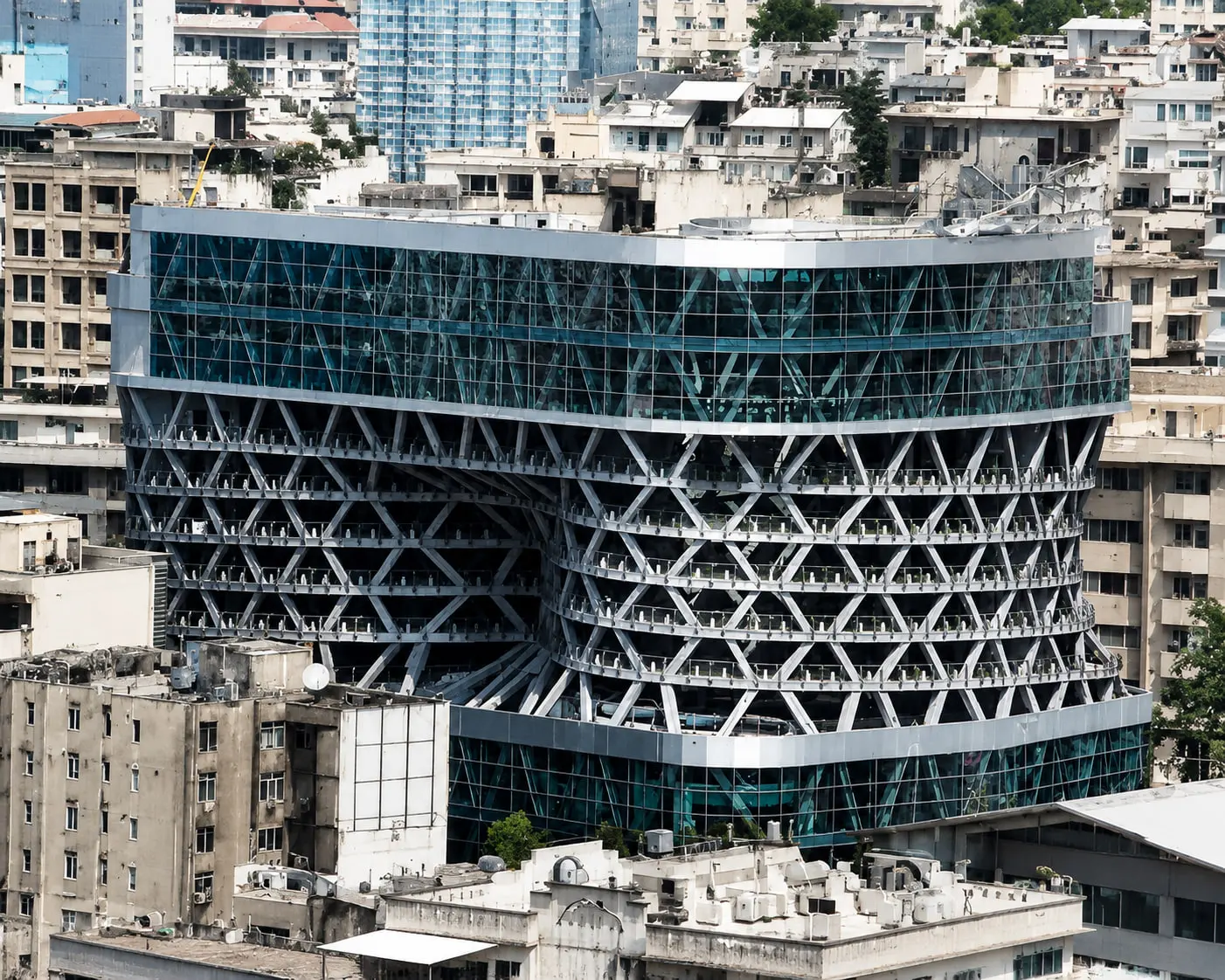 Ava Center seen across the neighbouring rooftops, the diagrid running the full length of the building