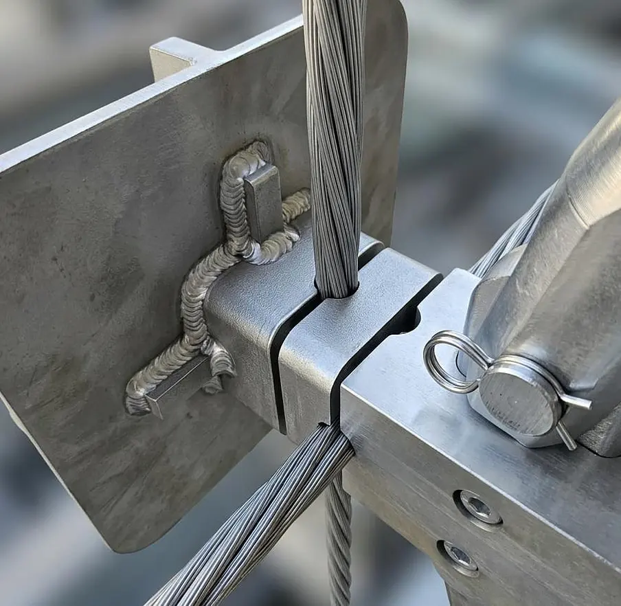 Point fixings clamping glass to a cable net, Moghaddas Ardebili Office, Tehran
