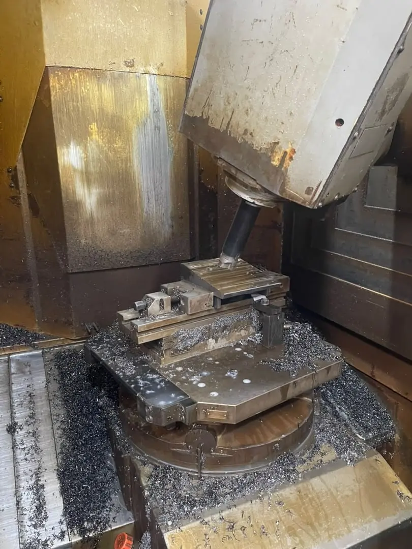 CNC machining in the workshop during tooling for DOMAINE