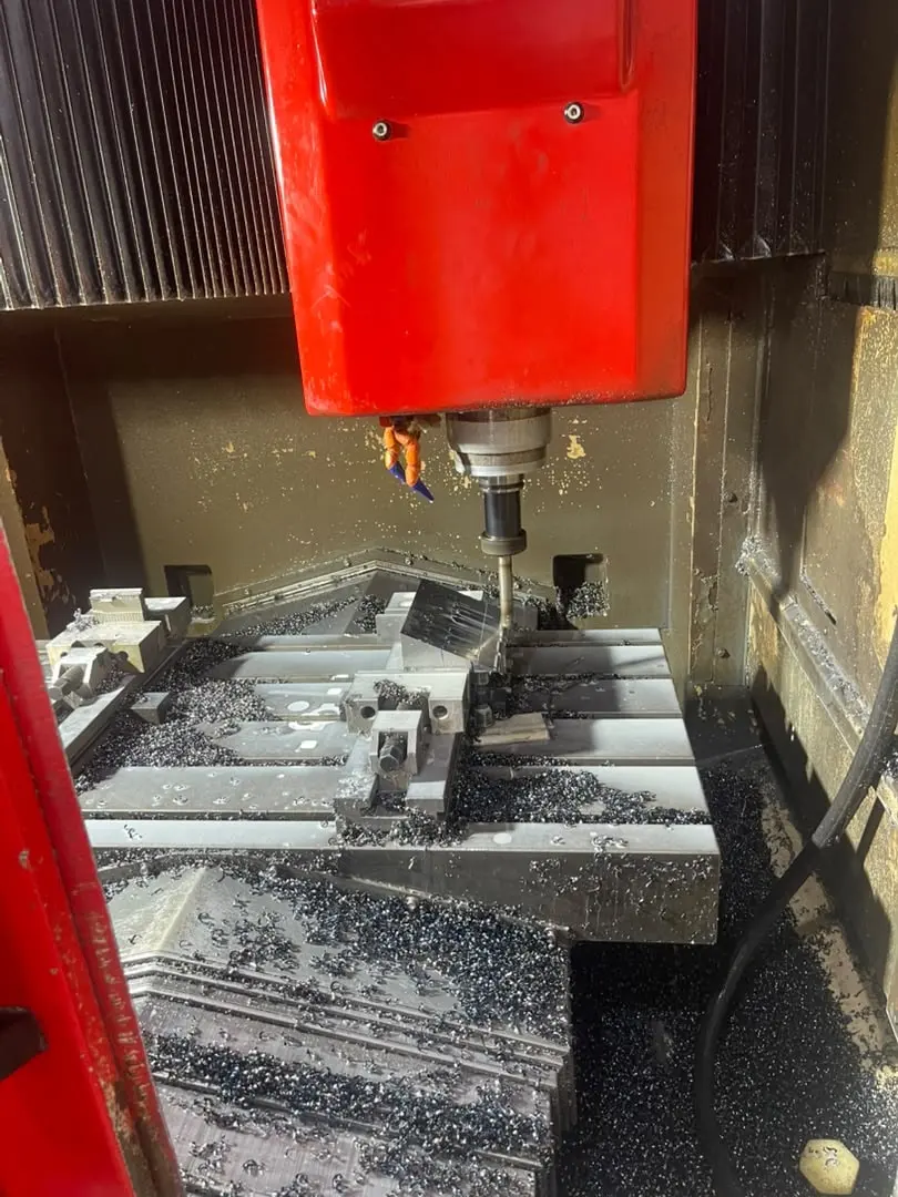 A CNC mill at work during tooling for DOMAINE