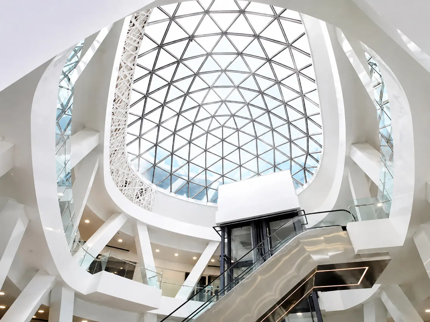 Triangulated free-form glass skylight over the multi-storey atrium of Ava Center Shopping Mall, Tehran