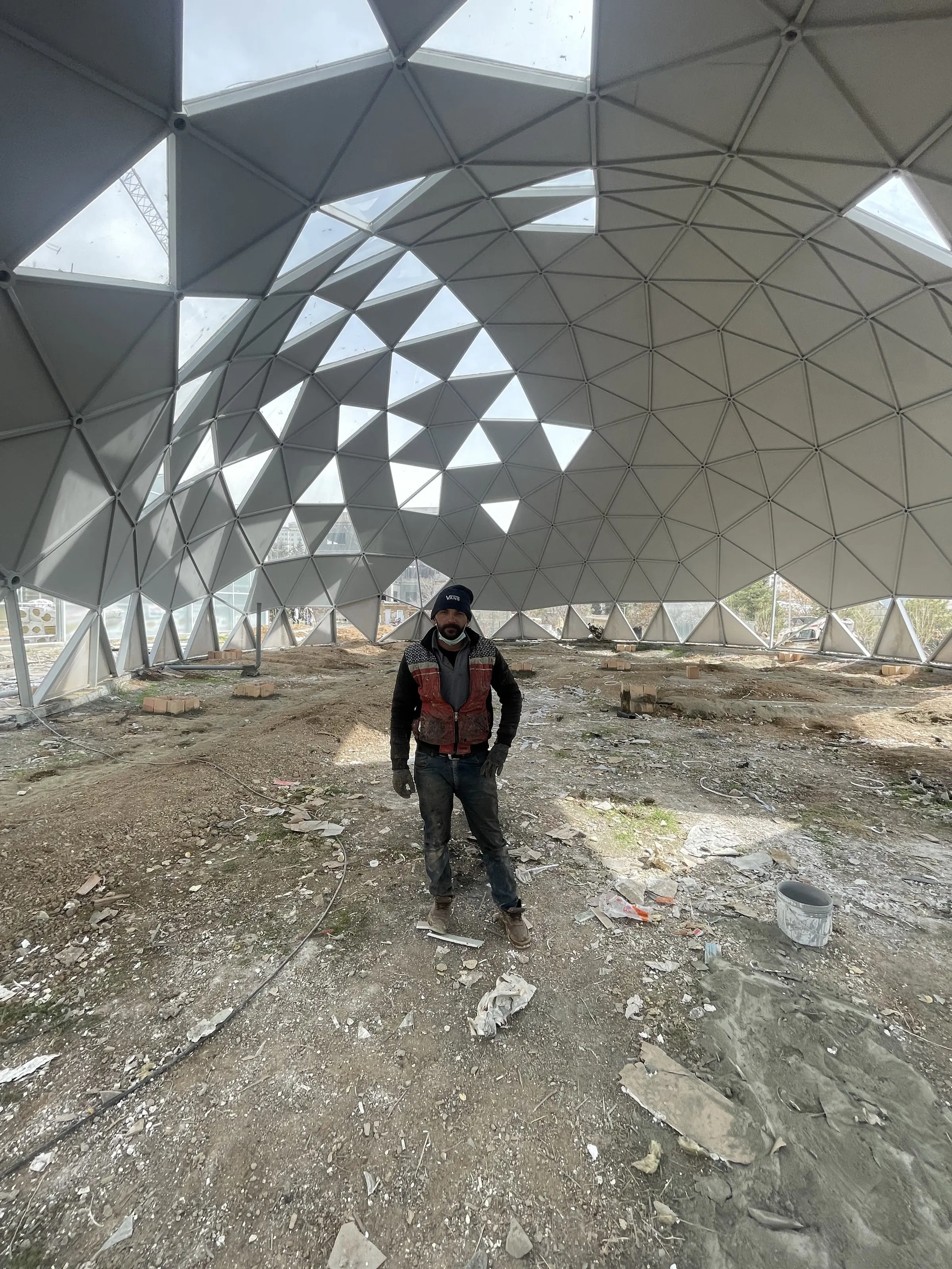Inside the larger dome, the triangulated shell seen from the floor