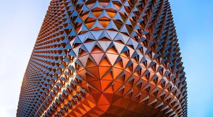 Reference example 3 of perforated metal dry façade — punched metal screens and second skins