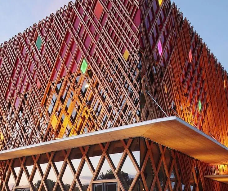 Reference example 7 of perforated metal dry façade — punched metal screens and second skins