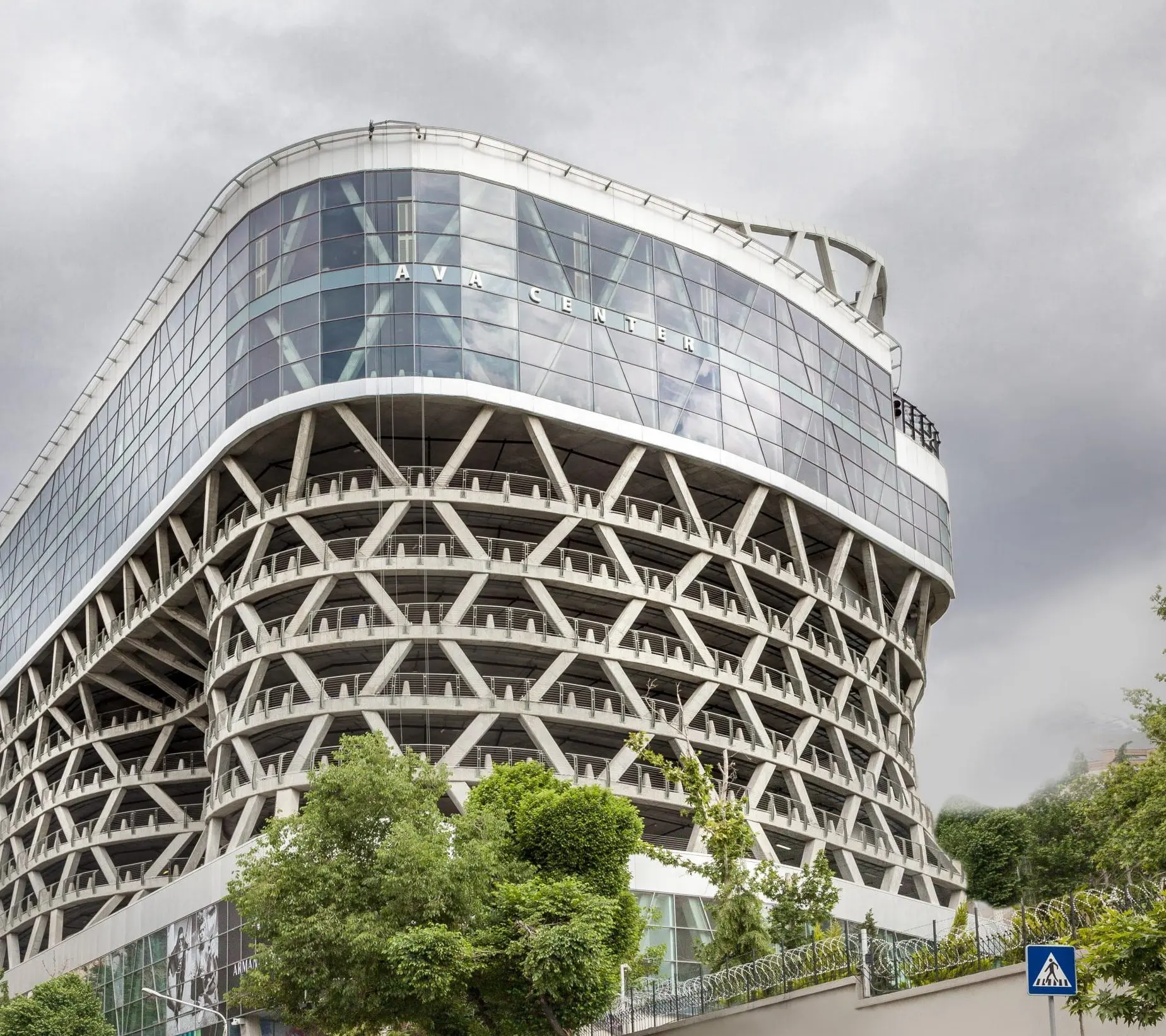 Ava Center Shopping Mall, Tehran — the concrete diagrid façade and the glazed upper floors