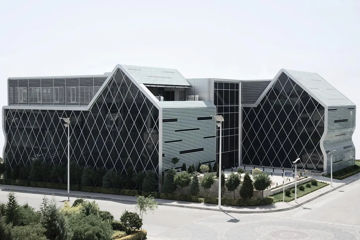 Sobhan Biotech Company — the completed façade seen from the approach road