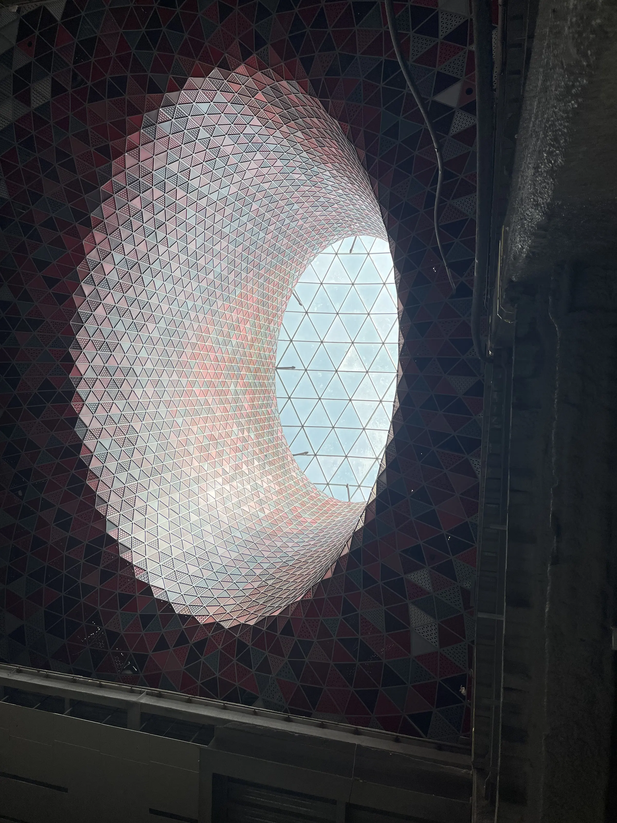 A wider view of the Yas oculus, showing how the funnel meets the surrounding envelope